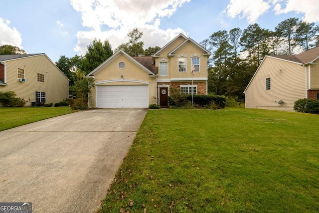 view of property featuring a garage and a front yard