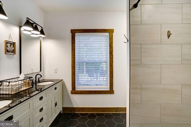 bathroom featuring vanity and tile patterned flooring