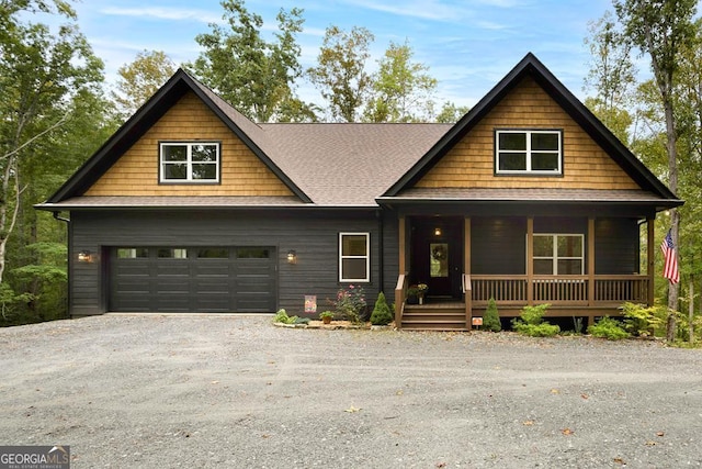 view of front of house with a garage and covered porch