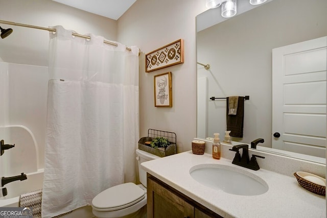 bathroom featuring vanity, toilet, and a shower with shower curtain