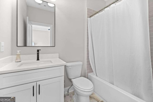 full bathroom with shower / bath combination with curtain, vanity, and toilet