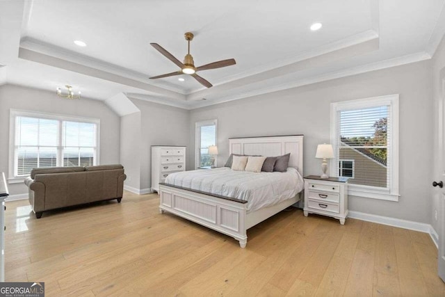 bedroom with ceiling fan, light hardwood / wood-style floors, and multiple windows