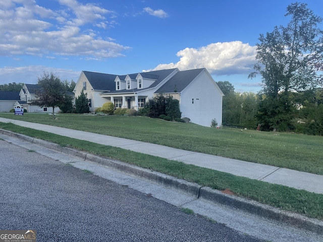 view of front of home featuring a front yard