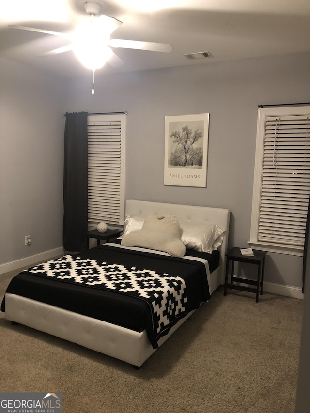 bedroom featuring carpet and ceiling fan