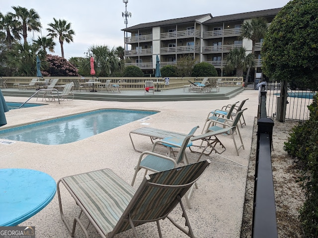 85 Van Horne Ave Unit B5, A, Tybee Island, GA 31328 - view of pool with a patio