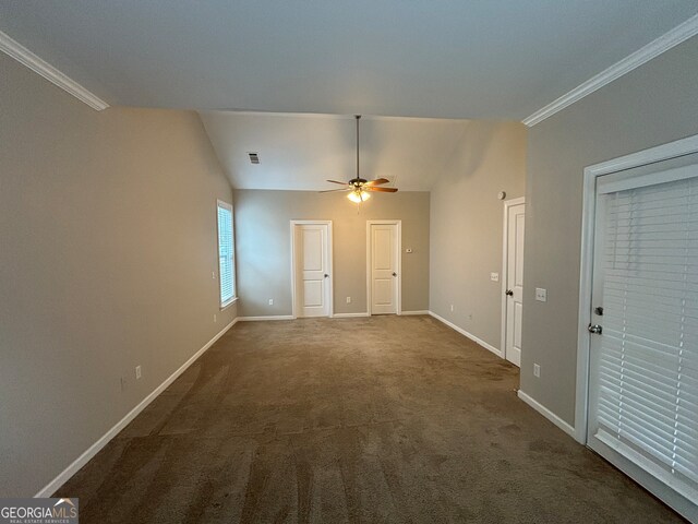 carpeted empty room with ceiling fan and ornamental molding