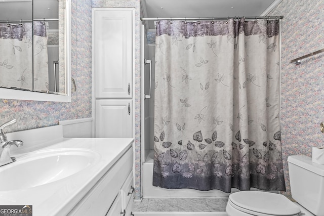 full bathroom featuring vanity, shower / bath combination with curtain, crown molding, tile patterned flooring, and toilet