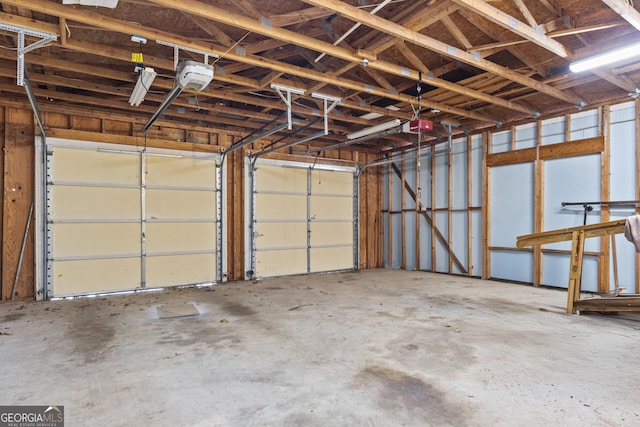 garage featuring a garage door opener