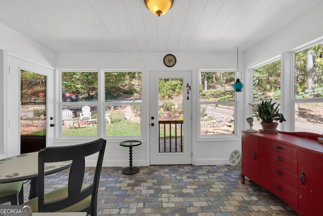 sunroom / solarium featuring a wealth of natural light