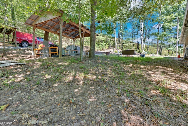 view of yard featuring a carport