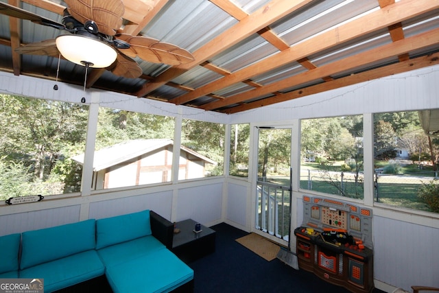 sunroom / solarium with ceiling fan