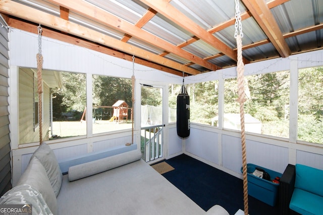 sunroom with vaulted ceiling