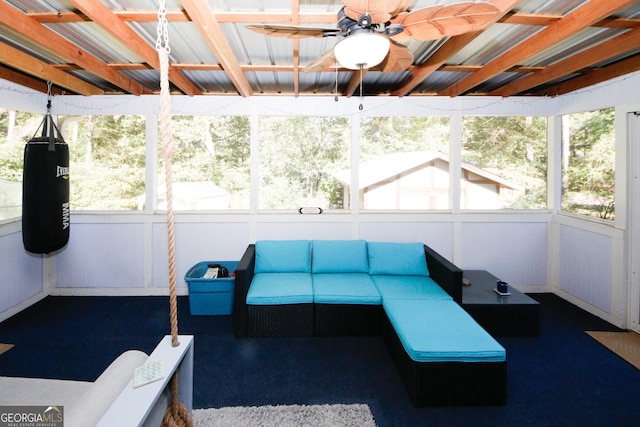 sunroom / solarium with ceiling fan and a wealth of natural light