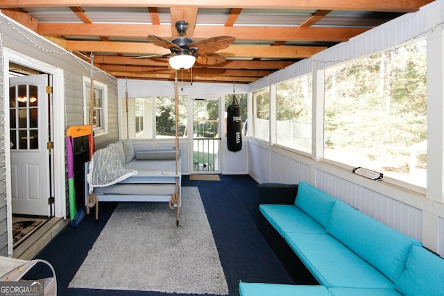 sunroom / solarium with ceiling fan