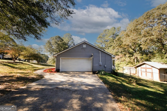 view of side of home with a yard