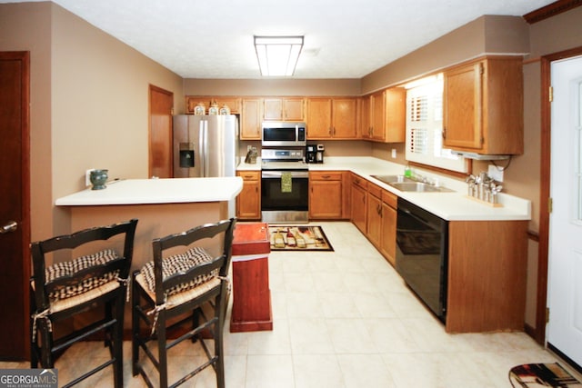 kitchen featuring stainless steel appliances and sink