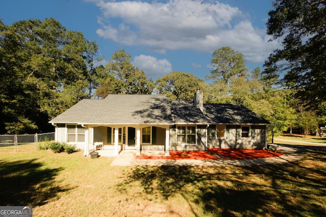 view of front of home with a front yard