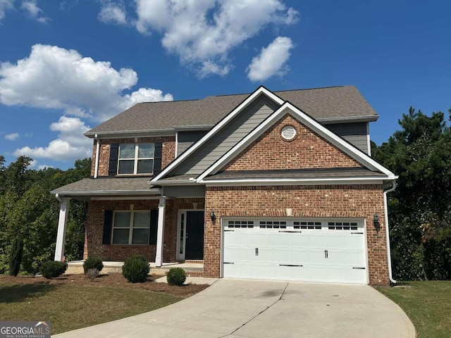 craftsman inspired home featuring a porch and a front lawn