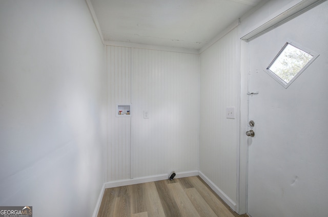 laundry area with washer hookup and light wood-type flooring