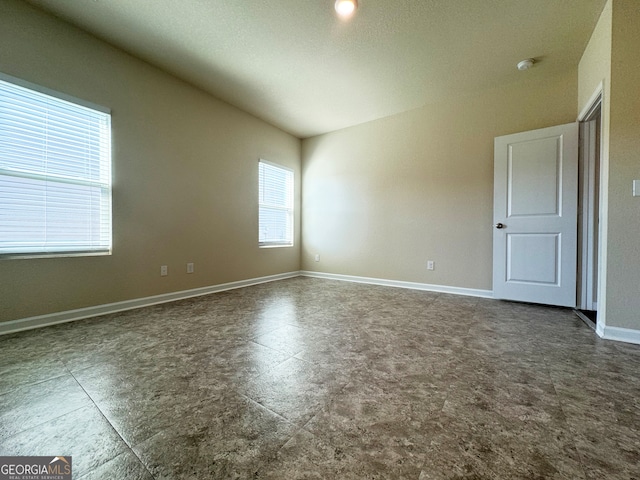 unfurnished room with a healthy amount of sunlight