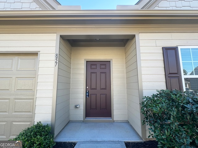 entrance to property with a garage