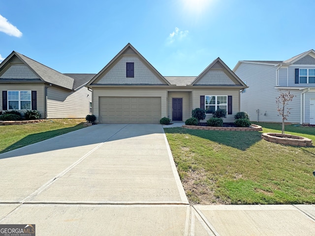 view of front facade featuring a front yard and a garage