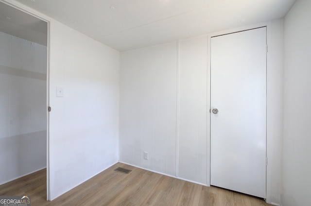 unfurnished bedroom featuring light hardwood / wood-style floors