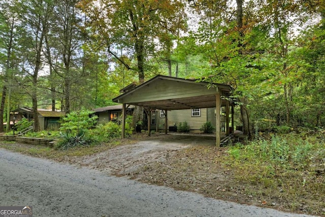 exterior space featuring a carport