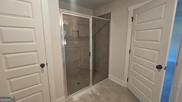 bathroom with an enclosed shower