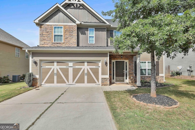 craftsman-style home featuring a garage, central AC unit, and a front lawn