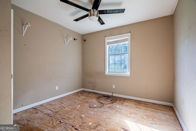 unfurnished room featuring ceiling fan