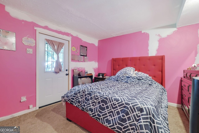 4693 Hairston Crossing Rd, Stone Mountain, GA 30083 - carpeted bedroom with baseboards and a textured ceiling