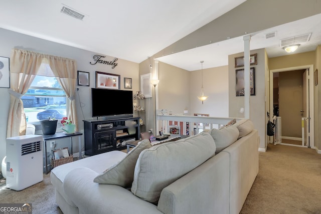 living room with light carpet, lofted ceiling, and radiator heating unit