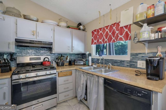 kitchen featuring black dishwasher, stainless steel gas range, sink, white cabinetry, and a textured ceiling