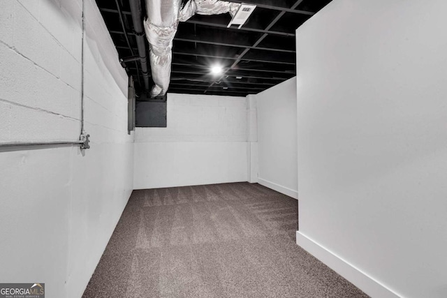below grade area featuring carpet floors