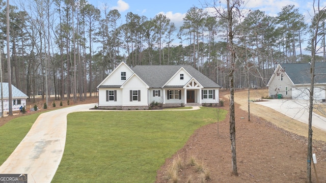 view of front of property with a front lawn