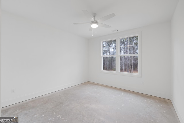 unfurnished room with ceiling fan