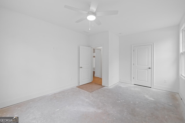 unfurnished bedroom featuring ceiling fan