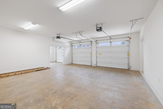 garage featuring a garage door opener