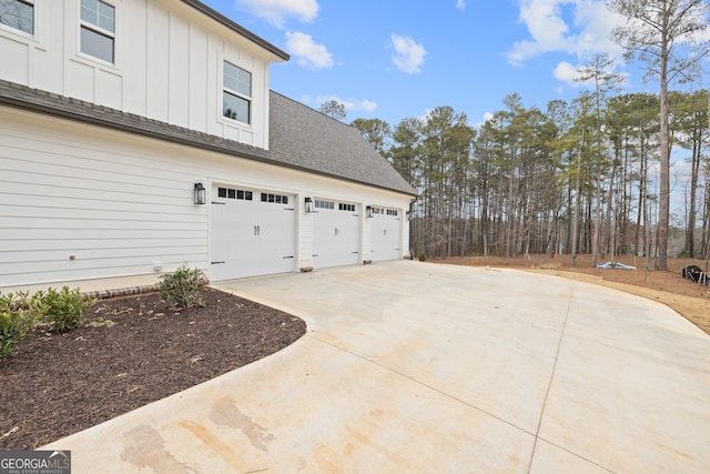 view of side of home with a garage