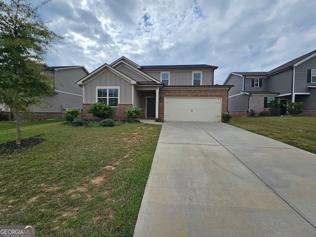 view of front of home featuring a front lawn and a garage