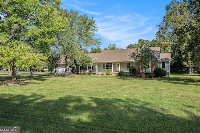 ranch-style house featuring a front lawn