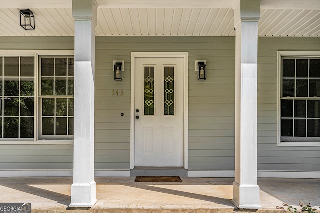 property entrance with a porch