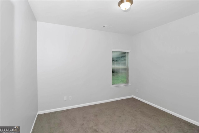 view of carpeted spare room