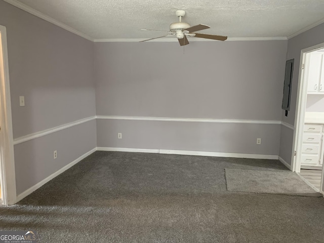 carpeted empty room with ceiling fan, a textured ceiling, and ornamental molding