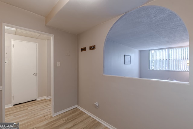 hall featuring light wood-type flooring