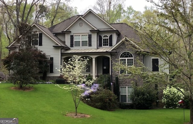 view of front of home featuring a front lawn