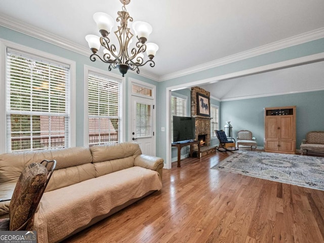 interior space with ceiling fan, high vaulted ceiling, light hardwood / wood-style floors, and ornamental molding