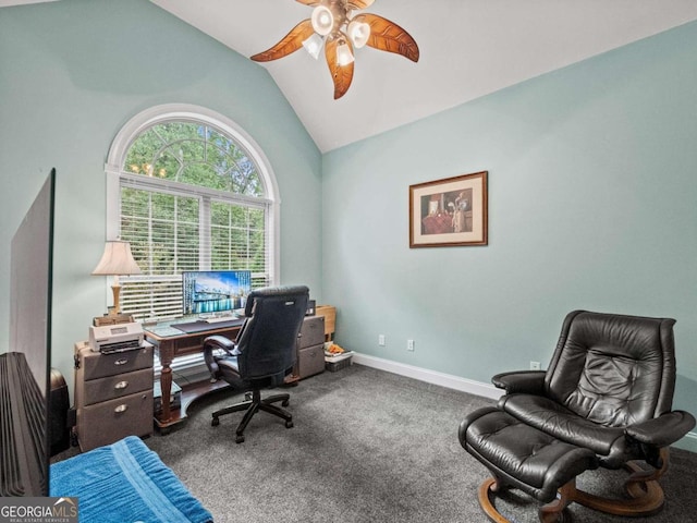 carpeted home office featuring ceiling fan and vaulted ceiling