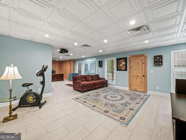 living room featuring wood walls